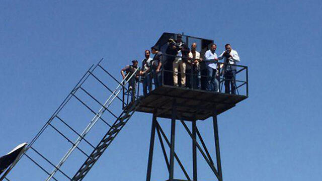 Journalists on Hezbollah's tour observing the Lebanon-Israel border