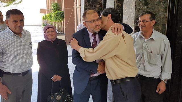 Abu Sneineh (center) receiving well-wishers following his election (Photo: Elior Levy)