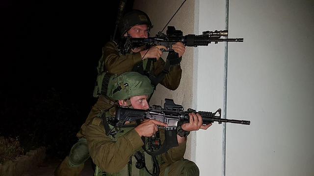 IDF forces raid Hamas targets