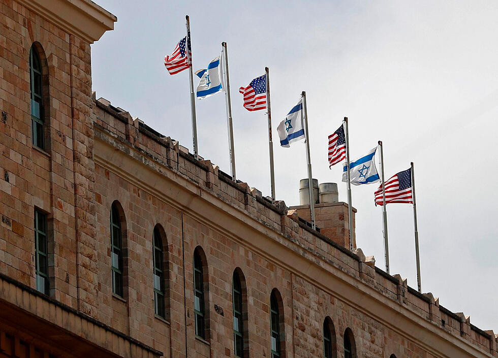Flags atop the King David Hotel (Photo: AFP)