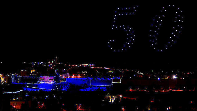 Drones spell out '50' above Jerusalem (Photo: Mizmor Productions) (צילום: מזמור הפקות) Drones spell out '50' above Jerusalem (Photo: Mizmor Productions)