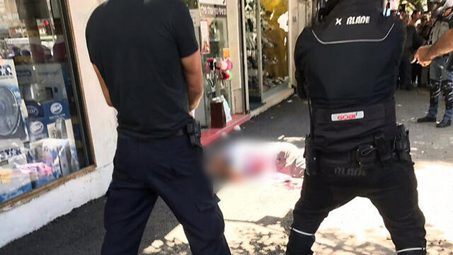 The stabber after being shot and neutralizednullnull The stabber after being shot and neutralized