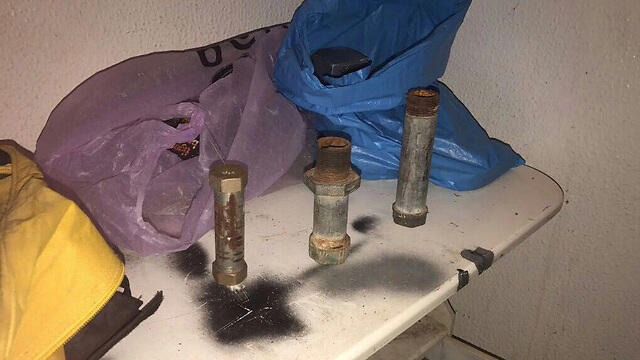 Pipe bombs discovered at the site (Photo: Shin Bet) (צילום: תקשורת שב"כ) Pipe bombs discovered at the site (Photo: Shin Bet)
