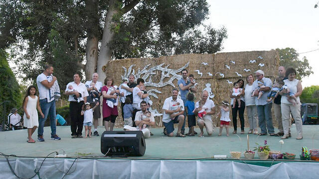 Babies presented before their community elders (Photo: Avihu Shapira)
