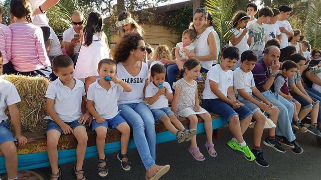 Kfar Baruch celebrates Shavuot with in a hay-fevered dream (Photo: Jezreel Valley Regional Council's Spokesperson's Office)