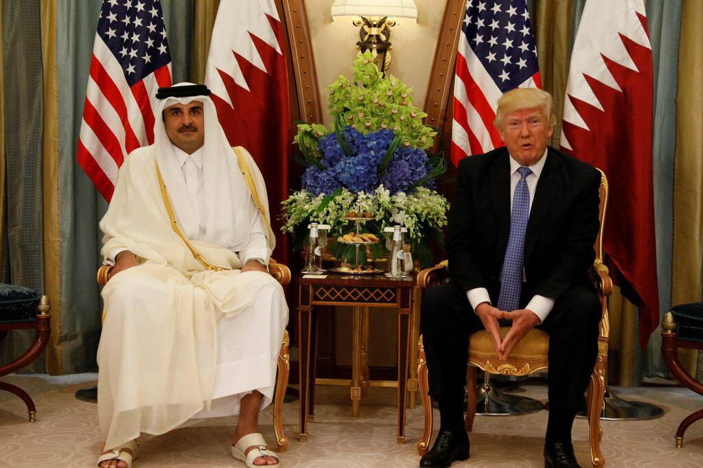 Qatari leader Tamim bin Hamad Al Thani and Trump in 2017 