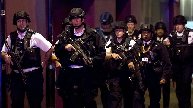 Armed police after the London attack (Photo: EPA)nullnull Armed police after the London attack (Photo: EPA)