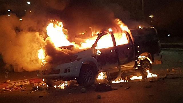 Police car burnt in the riotnullnull Police car burnt in the riot