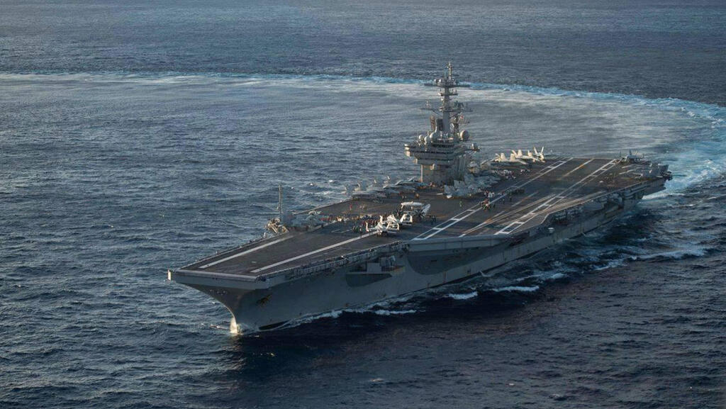 The aircraft carrier — the USS George H.W. Bush — is also on its way to the Middle East 