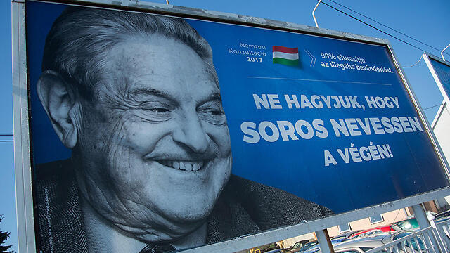 Агитационная кампания против Джорджа Сороса. Фото: AFP