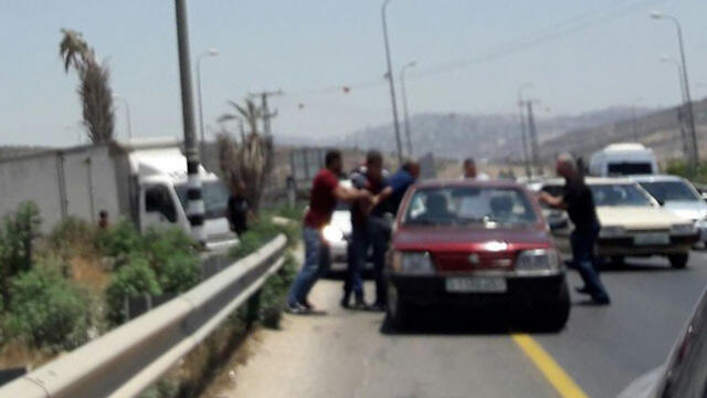 Photo taken by Sukkot purporting to depict Palestinians kidnapping a mannullnull Photo taken by Sukkot purporting to depict Palestinians kidnapping a man