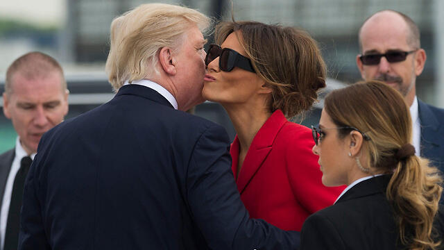 Дональд и Мелания Трамп в Париже. Фото: AFP