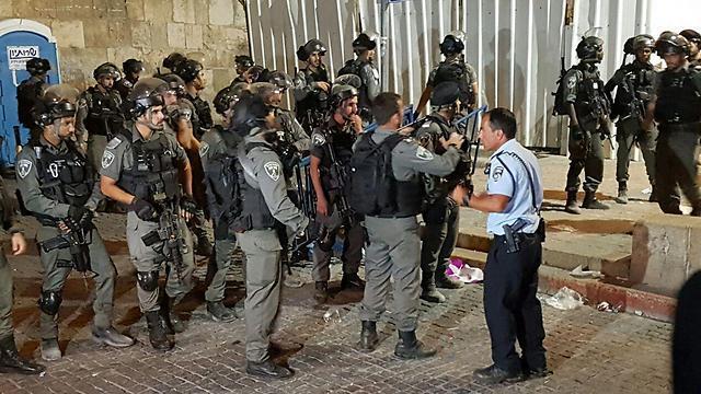 Police forces at the scene (Photo: Gil Yohanan)