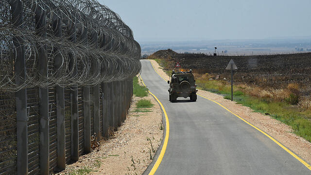 The fence along the Israeli border with Syria was refurbished following the outbreak of the Syrian civil war (צילום: אביהו שפירא) The fence along the Israeli border with Syria was refurbished following the outbreak of the Syrian civil war