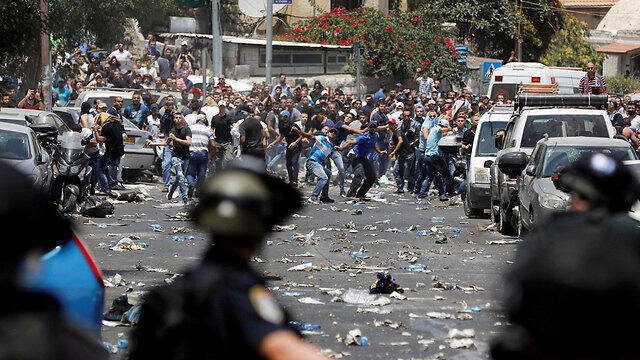 Palestinians clash with security forces in Jeurslaem in July 2017