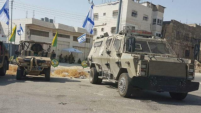Settlers move into Machpelah House (Photo: TPS)