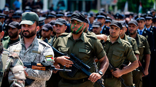 Hamas militants march