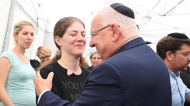 Rivlin with Michal Salomon, Elad's widow (Photo: Mark Neiman/GPO) (צילום: מארק ניימן, לע"מ) Rivlin with Michal Salomon, Elad's widow (Photo: Mark Neiman/GPO)