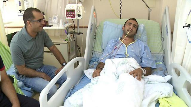 Abed al-Fatah Abu Halal (R) and his brother (Photo: Avi Hai)
