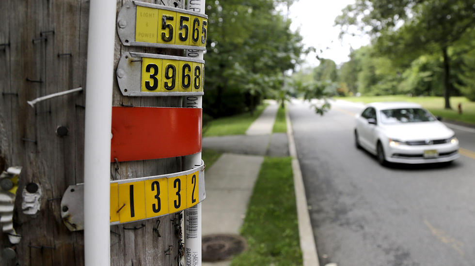PVC piping placed on utility poles around a New Jersey town bordering New York as eruv for Jewish community (Photo: AP)