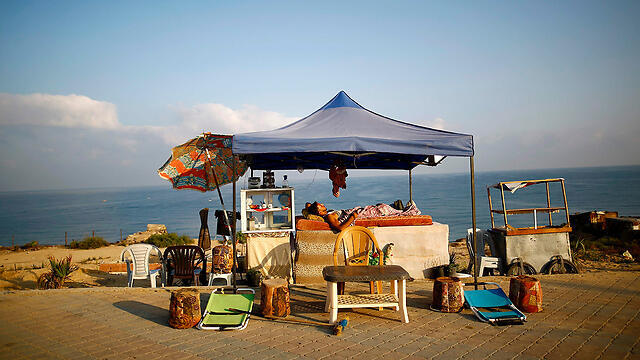 Пляж в "блокадной" Газе. Фото: AFP (צילום: AFP) Пляж в "блокадной" Газе. Фото: AFP