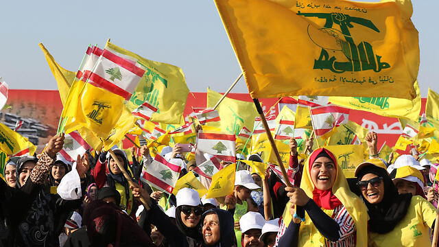 Hezbollah supporters in a rally, Lebanon (Photo: AFP) (צילום: AFP) Hezbollah supporters in a rally, Lebanon (Photo: AFP)