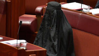 Australian Senator Pauline Hanson wears a burqa in Parliament