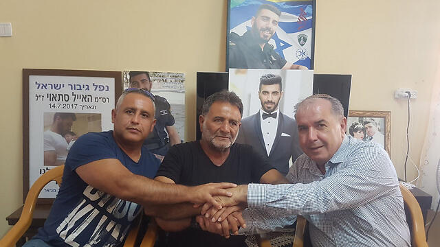 Bereaved fathers Malka, Cohen and Satawinullnull Bereaved fathers Malka, Cohen and Satawi