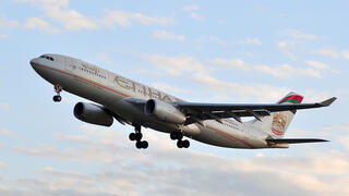 Etihad Airways plane; airports in the UAE were damaged and suffered heavy disruptions 