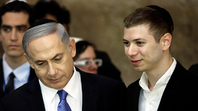 PM Netanyahu's son Yair (R) was recorded in an embarrassing phone conversation (צילום: AFP) PM Netanyahu's son Yair (R) was recorded in an embarrassing phone conversation