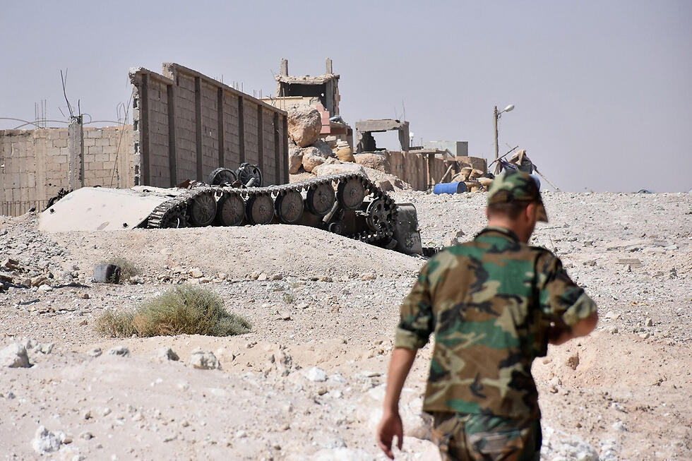 Hezbollah fighters in Syria (צילום: AFP) Hezbollah fighters in Syria