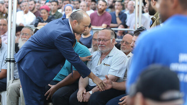 Education Minister Naftali Bennett pays his respects (Photo: Amit Shabi) (צילום: עמית שאבי) Education Minister Naftali Bennett pays his respects (Photo: Amit Shabi)