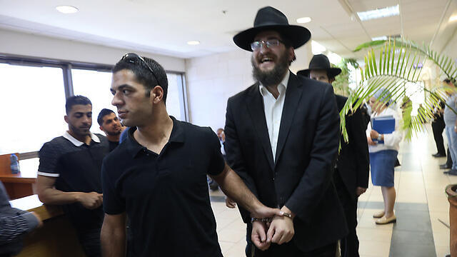 Обвиняемый по делу газеты "Ха-Пелес". Фото: Шауль Голан (צילום: שאול גולן) Обвиняемый по делу газеты "Ха-Пелес". Фото: Шауль Голан