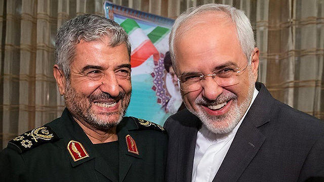 Iranian Foreign Minister Mohammad Javad Zarif (R) with Revolutionary Guards Commander Mohammad Ali Jafari 