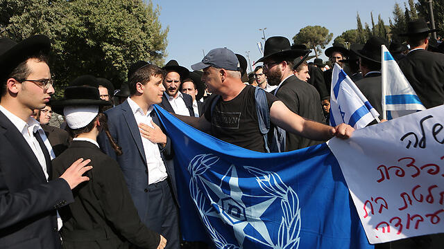 Haredi protesters clashed with police retirees also demonstrating near the Knesset