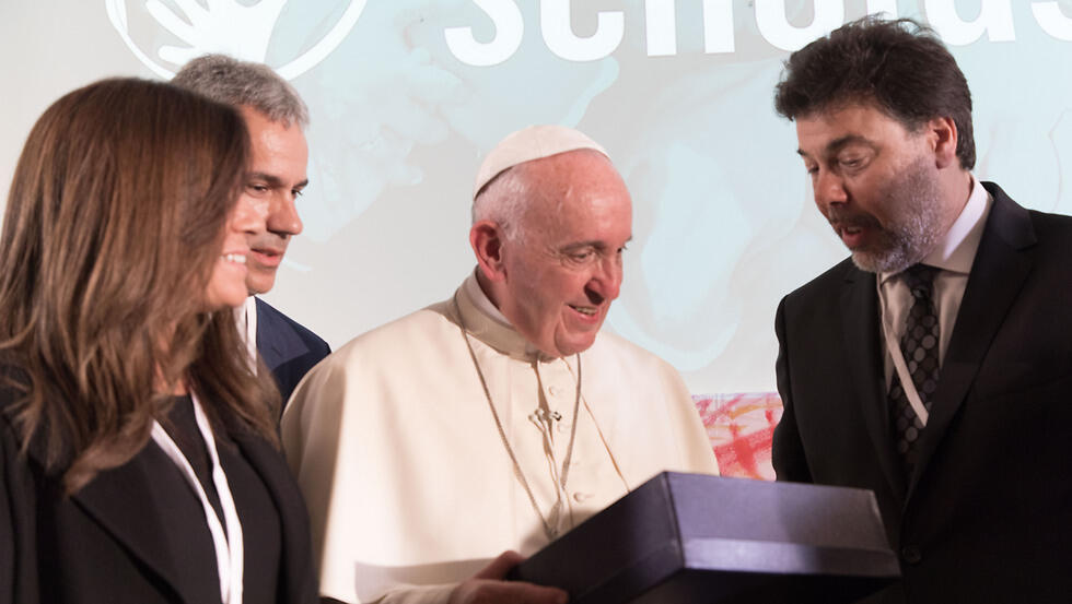 Pope Francis, center, with Darío Werthein, Chairman of the Board of World Ort, left.