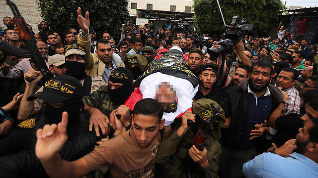 Funeral of Islamic Jihad fighters killed in tunnel explosion (צילום: AFP) Funeral of Islamic Jihad fighters killed in tunnel explosion