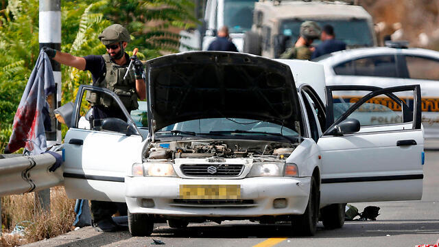The car was shot at by Givati soldiers after its driver disobeyed orders to stop (צילום: AFP) The car was shot at by Givati soldiers after its driver disobeyed orders to stop