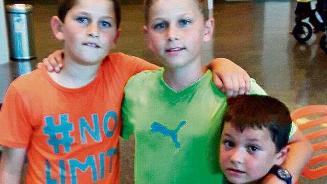 Itay, Nadan and Yuval Mizrahi, sons of Baruch Mizrahi, who died in terror attack