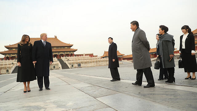 Дональд и Мелания Трамп в Запретном городе в Пекине. Фото: АР