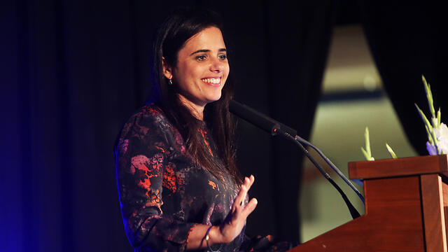 Justice Minister Shaked said final law would 'minimize damage' to public servants