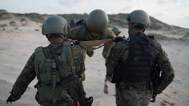 Учения спасательно-эвакуационного отряда. Фото: пресс-служба ЦАХАЛа (צילום: דובר צה"ל) Учения спасательно-эвакуационного отряда. Фото: пресс-служба ЦАХАЛа