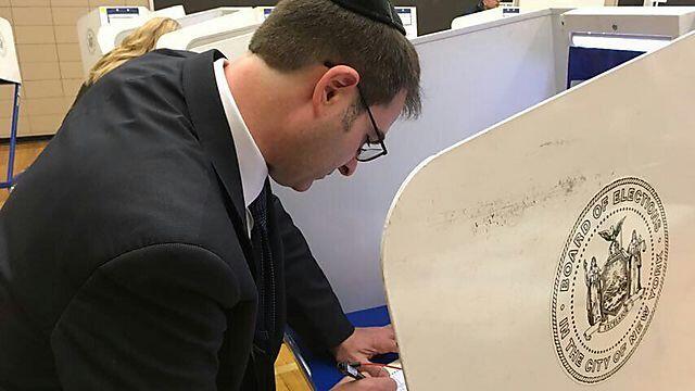 A Satmar follower votes on creating the new townnullnull A Satmar follower votes on creating the new town