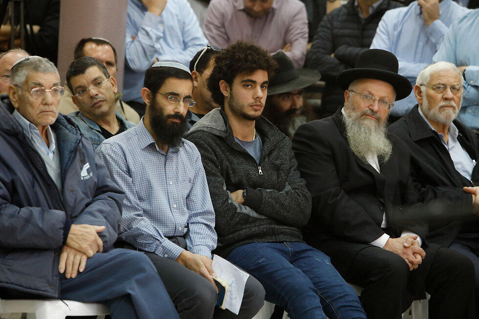 Hodaya's father (2nd from left) and Safed Chief Rabbi Eliyahu (2nd from right)