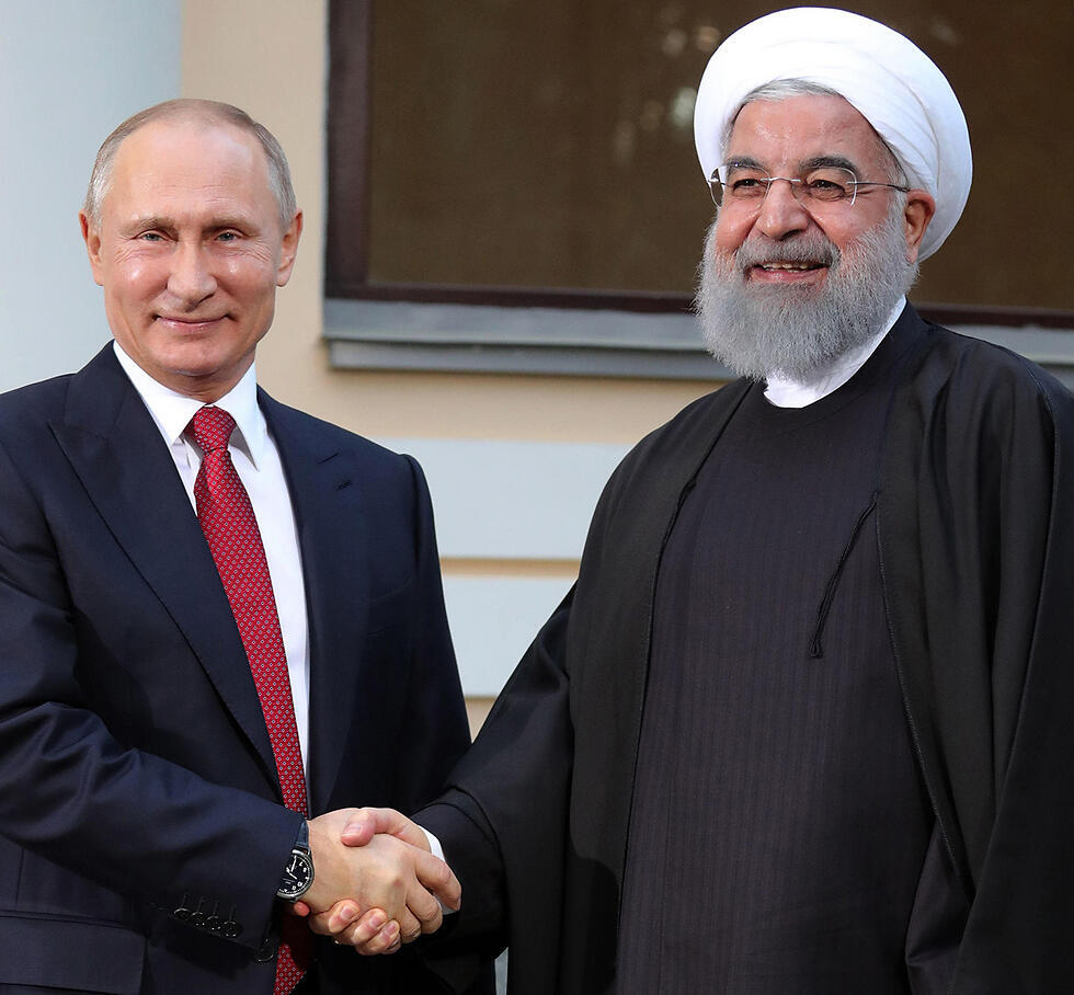 Рухани дружит с Путиным, но равняется на Китай. Фото: АР (צילום: AFP) Рухани дружит с Путиным, но равняется на Китай. Фото: АР