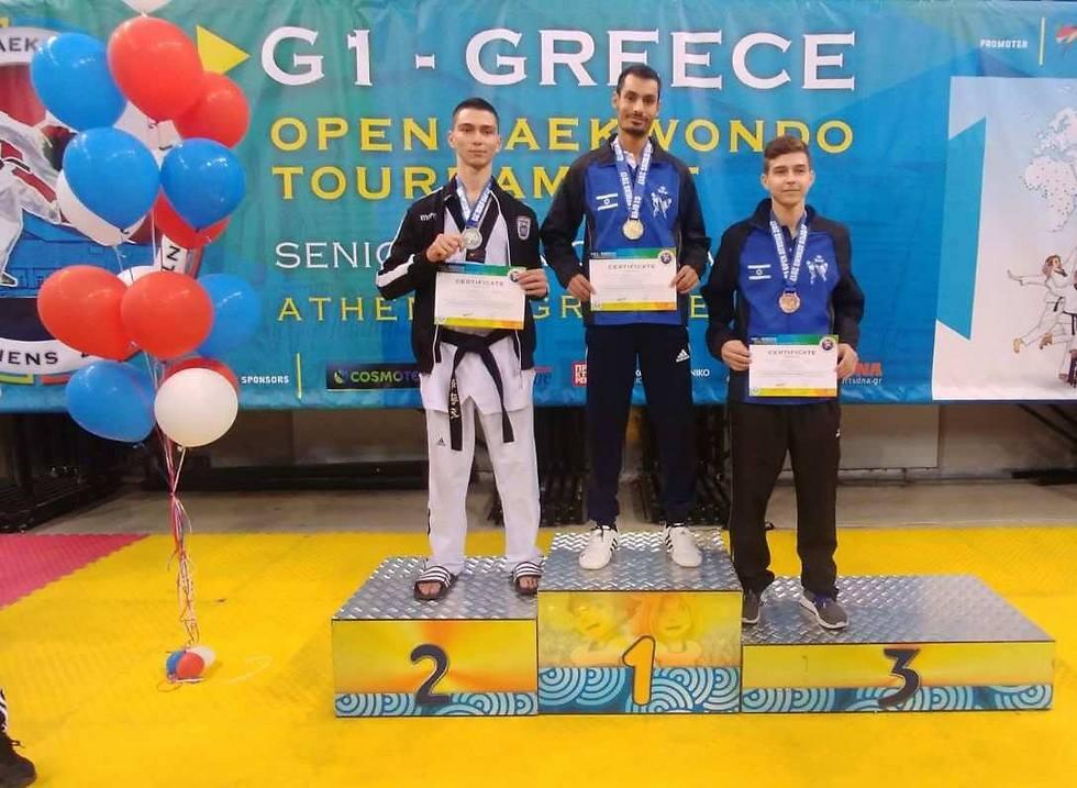 Реувен и Хаймович на пьедестале