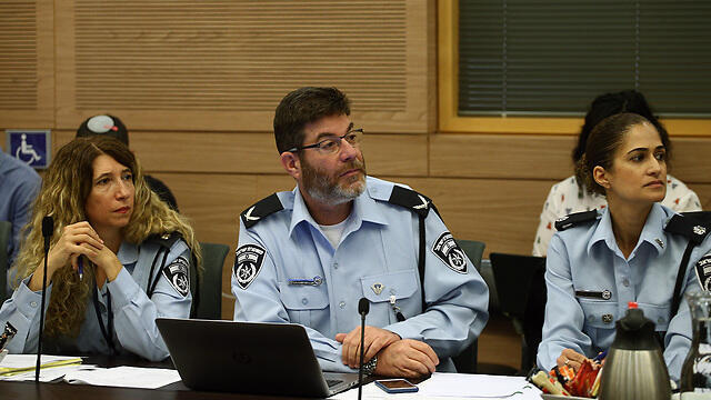 Police representatives at the meeting (צילום: אוהד צויגנברג) Police representatives at the meeting