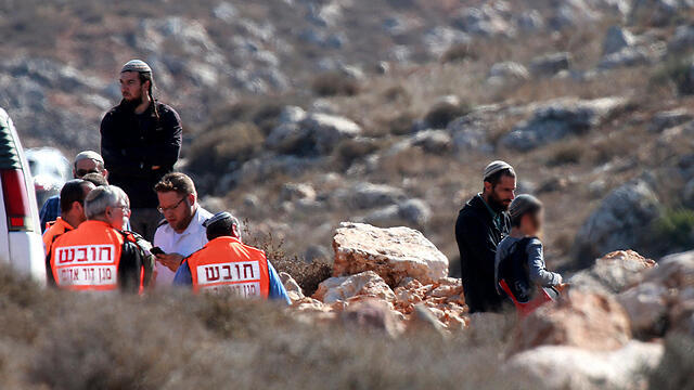Injured being treated by medics near Qusra