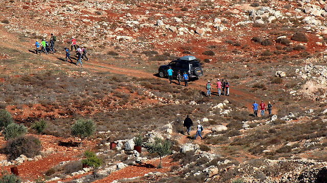 Settlers and Palestinians clash