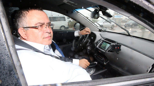 Bitan arriving at the Lahav 433 offices